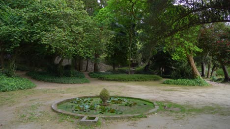 fountain overgrown with moss in crystal palace gardens