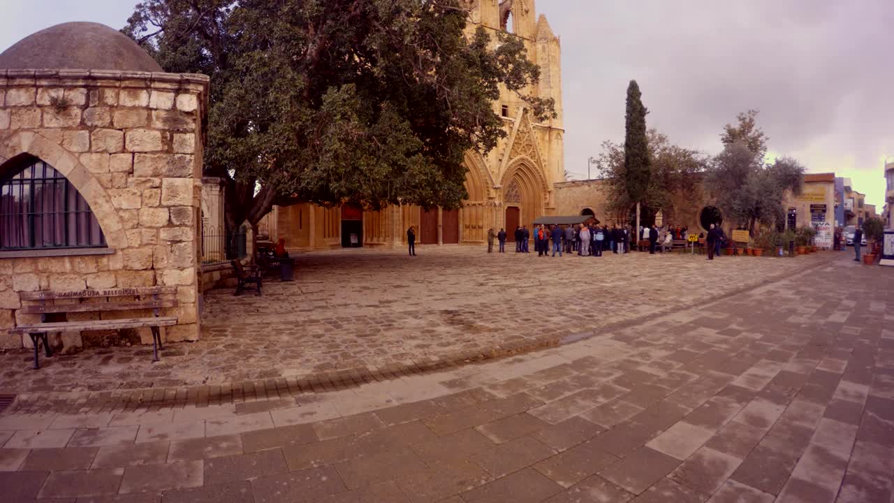people in front of Lala Mustafa Pasha Mosque St Nicholas Cathedral