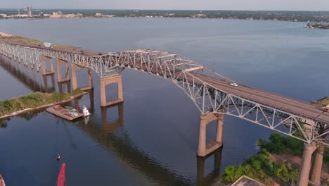 Aerial-of-cars-traveling-over-the-Calcasieu-River-Bridge-in-Lake-Charles,-Louisiana