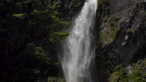 slow motion static footage of the top of the devil's punchbowl waterfall - arthur's pass, new zealand