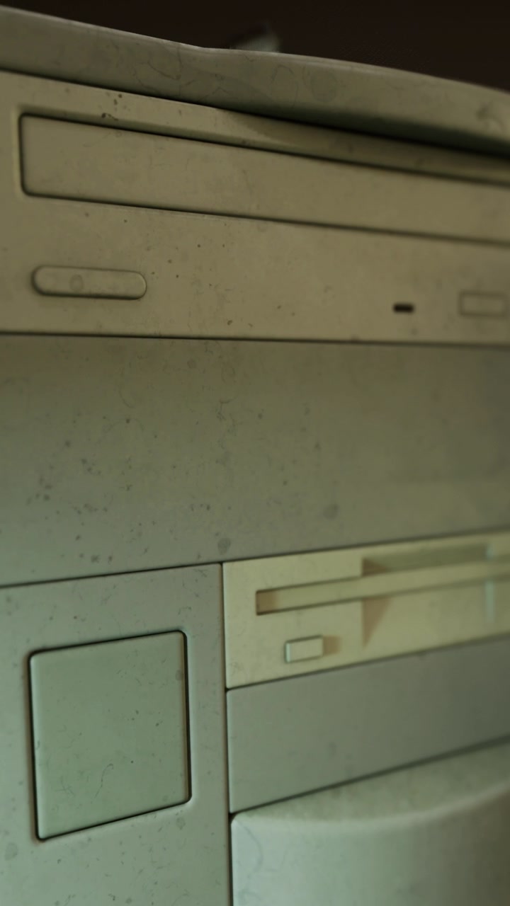 Old computer equipment and storage unit in a workspace setting