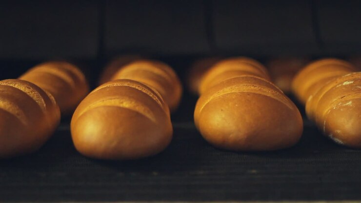 Food processing plant. Loaf bread factory process. Bakery industry