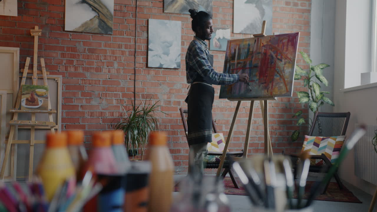 Artist Painting in a Creative Studio