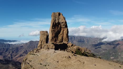 flight over of roque nublo, a volcanic rock in caldera of tejeda, gran canaria, canary islands, spain