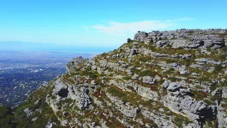 aerial ascend over rocky table mountain