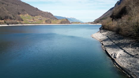 aerial along coast of lake lungern, obwalden, switzerland