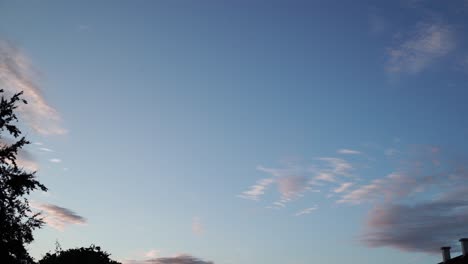 timelapse of clouds in the sky from noon to sunset