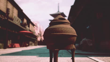 traditional japanese street with incense burner