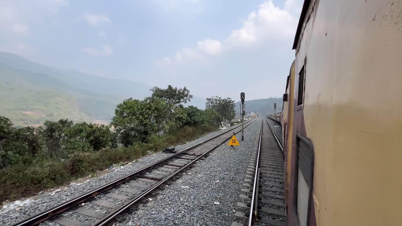 Natural scenery from inside the train outside.