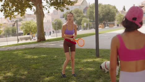 people exercising in a park in the city