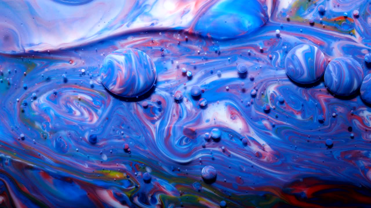 movimiento lento colores brillantes burbujas de aceite hermosa pintura color del universo moviéndose multicolor de cerca. pintura acrílica. fantástica superficie hipnótica. abstracto pintura de colores burbujas estructura de metamorfosis