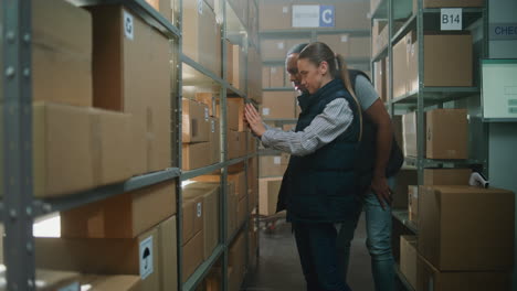 warehouse workers checking inventory