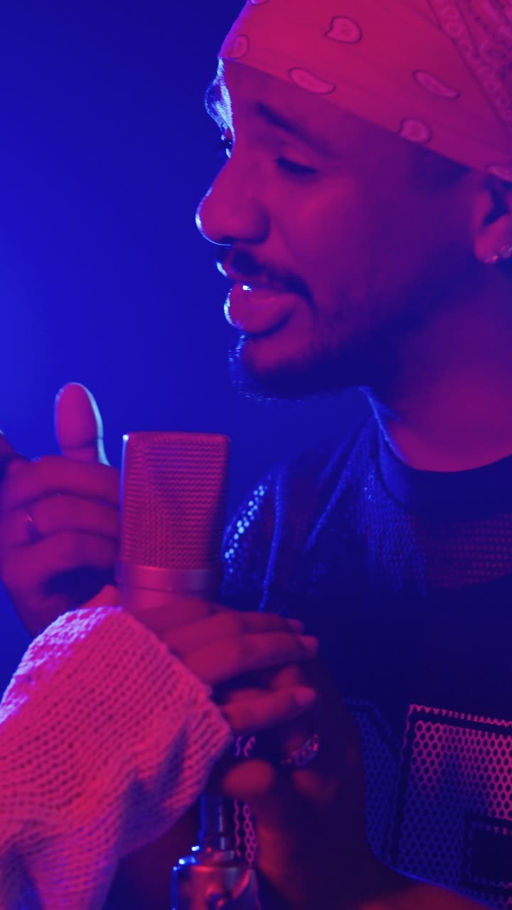 Man Singing into Microphone