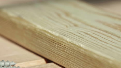 close-up of screws in wood
