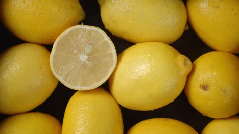 fresh juicy lemons slowly rotate.