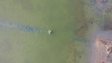 person fishing in a lake