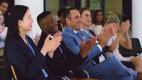 business people applauding in a business seminar 4k