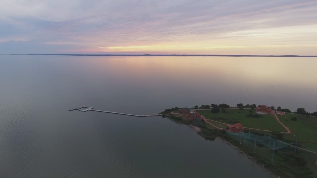 Bird Migration Ornithological Ringing Station in Vente Cape Horn At Sunset. Aerial Flying Forward