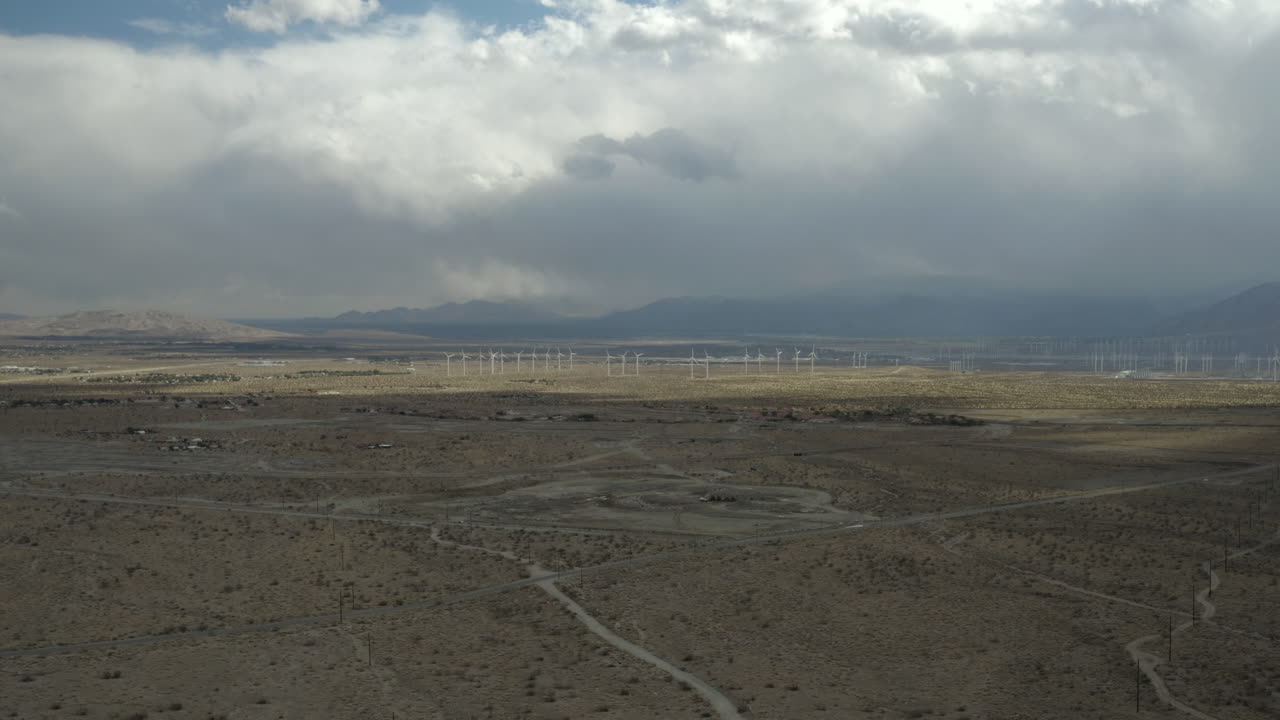 Aerial View of Wind Turbines in a Desert Landscape