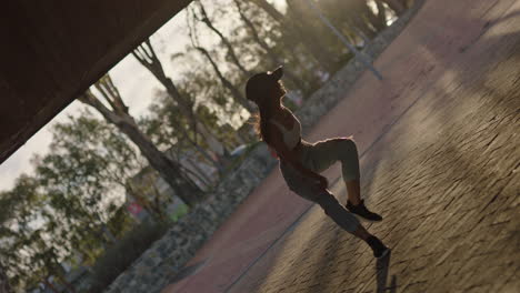 dancing woman young hip hop dancer in city enjoying fresh urban freestyle dance moves practicing expression at sunset
