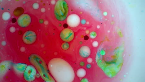 psychedelic multi-colored bubbles rotate in a liquid light show