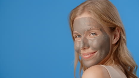 woman with clay face mask