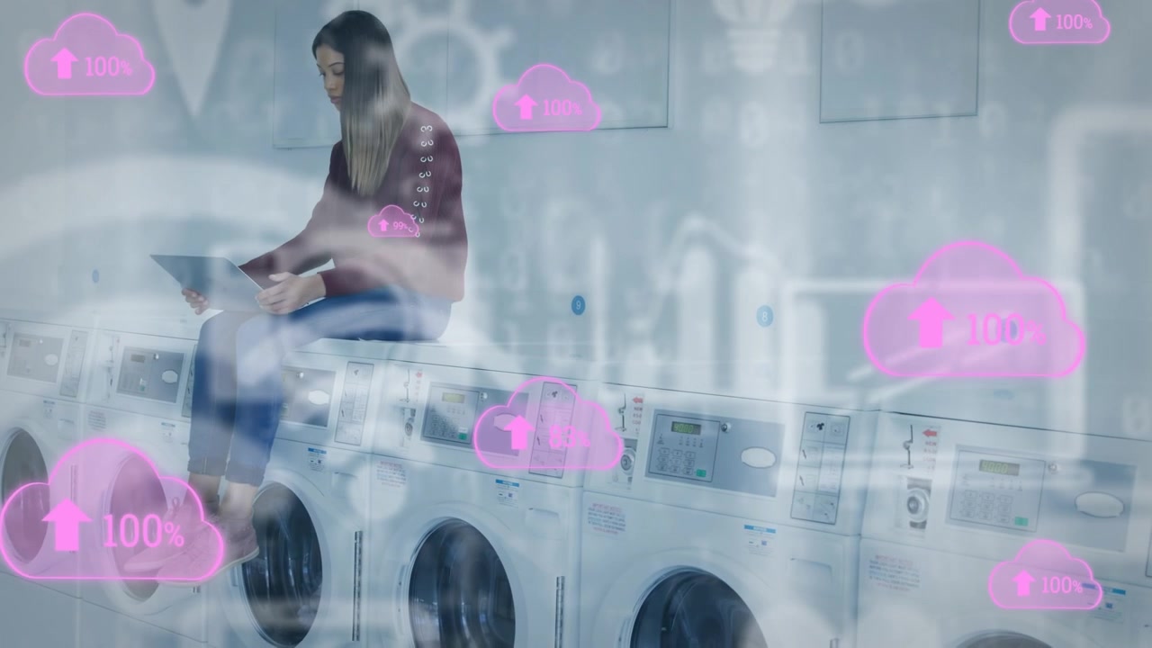 Young Woman Using Laptop in Laundromat with Cloud Computing Overlay