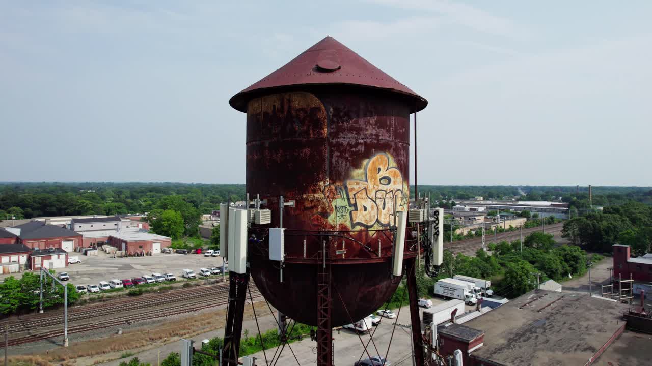Circular drone flight around the old grafitti-painted Warwick Water Tower