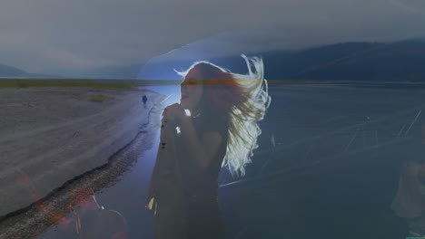 music industry woman singing into microphone on stage blending with beach, musician playing guitar