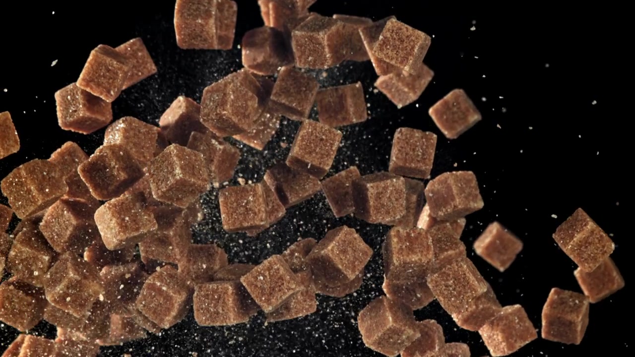 Brown Sugar Cubes Falling and Scattering in Slow Motion