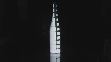 lights lighting up on a bottle