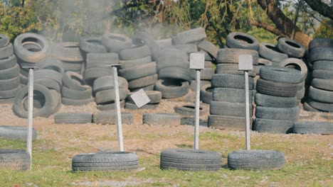 impressive metal targets in the shooting range. metal targets fall. shooting at targets