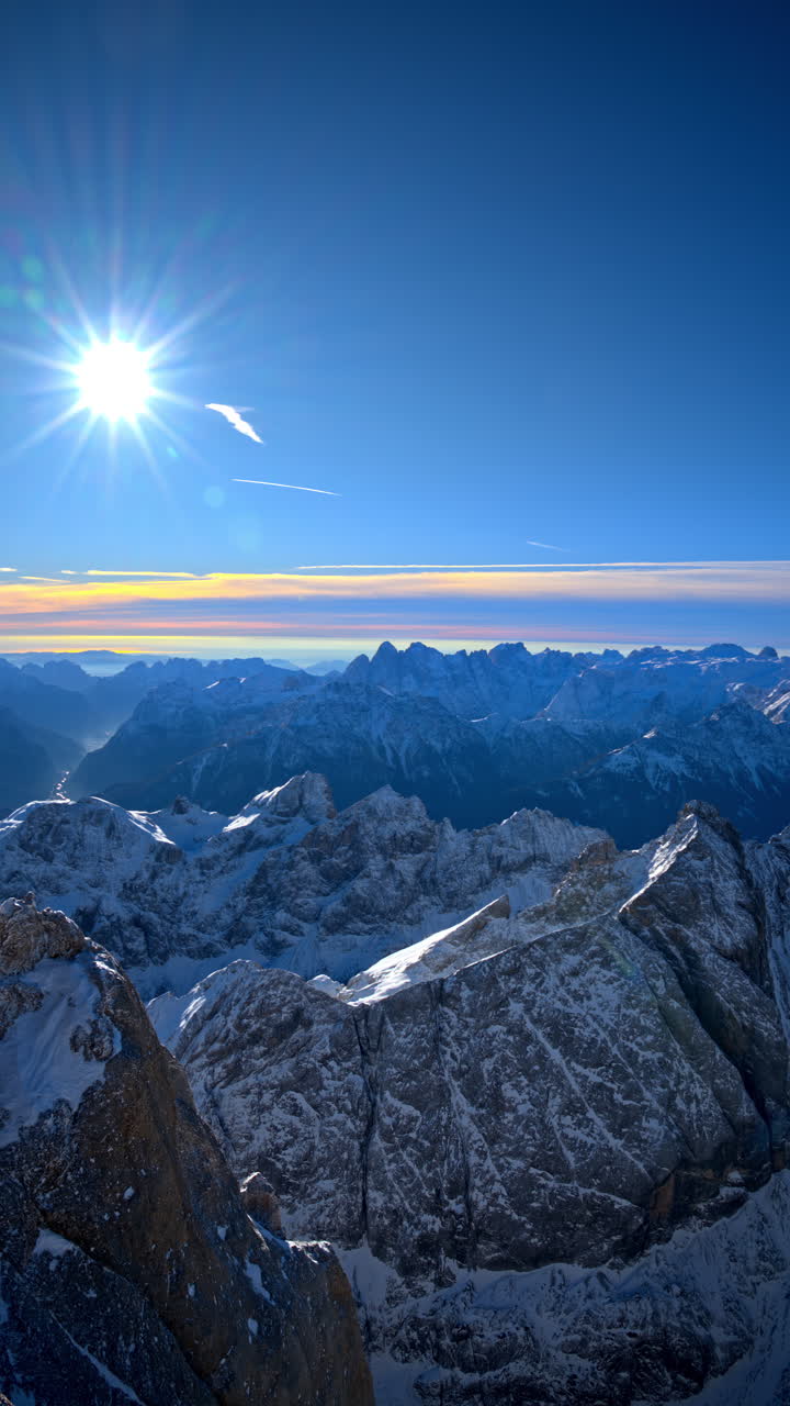 View of snow on the mountains in the Dolomites, Italy. Vertical