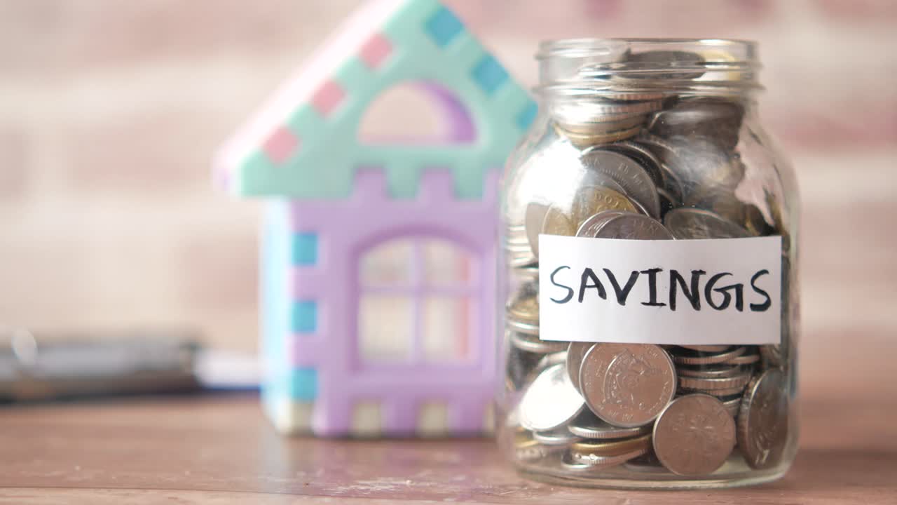 Saving for a house, children's savings jar