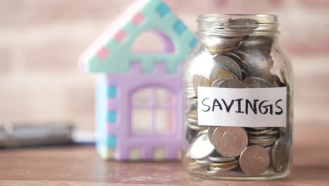 saving for a house, children's savings jar