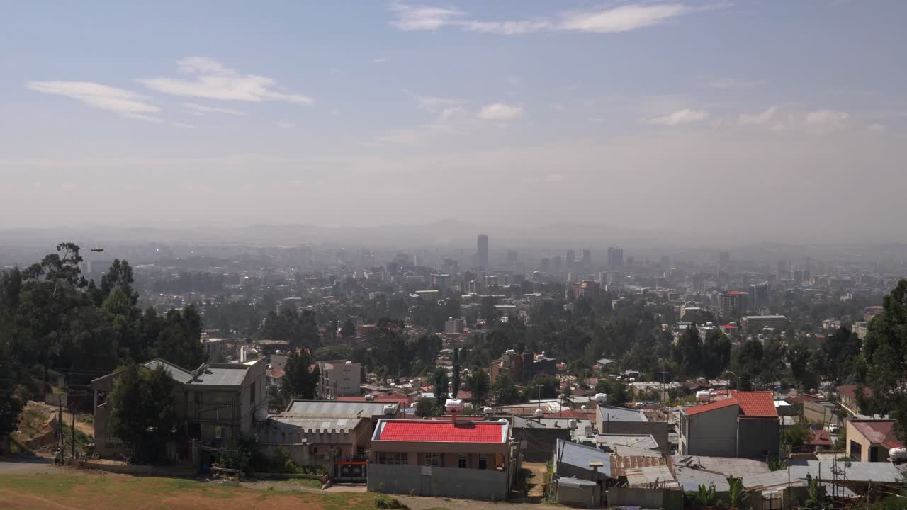 Panoramic View of a Hazy Urban Cityscape with Residential Areas