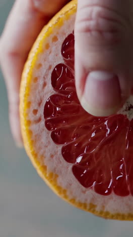 squeezing a grapefruit