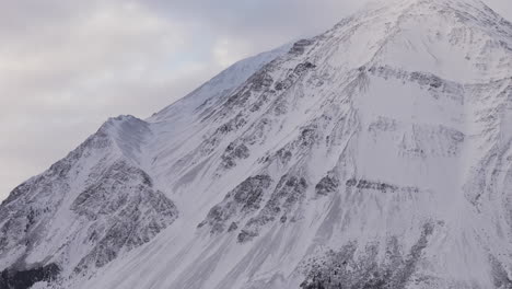 snow covering the mountains of kathleen lake in yukon, canada. static shot