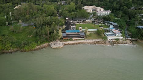 evening aerial view of pantai damai central santubong and sarawak cultural village, borneo