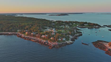 establishing aerial view over cape harbor during sunset