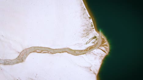 aerial view of flowing stream through arashan lakes in namangan, uzbekistan