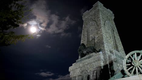 monument of freedom in bulgaria in the night, full moon, stara planina mountain