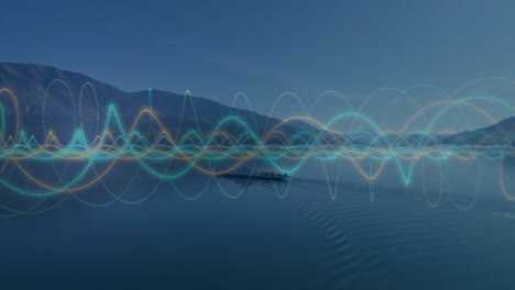 Animation of colorful wave patterns over serene lake with distant mountains