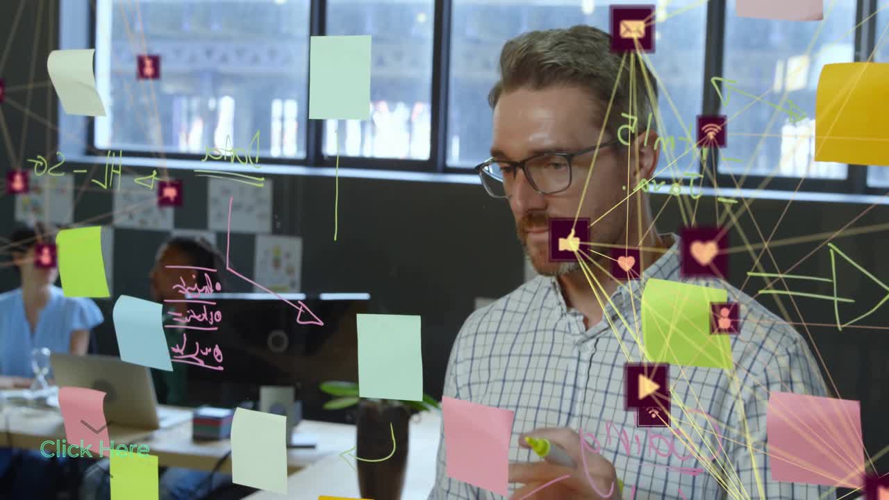 Business team brainstorming around glass board, displaying sticky notes with floating network icons