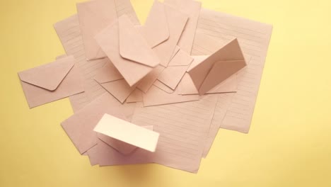 pile of pink envelopes and papers