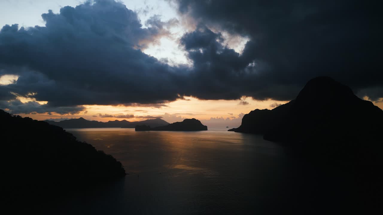 Aerial Drone View of El Nido, Palawan at Sunset – Cinematic Shot Featuring Ocean, Islands, Cliffs and Golden Tropical Light in the Philippines