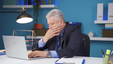 businessman falling asleep.