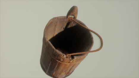 Old-used-rusted-wooden-bucket