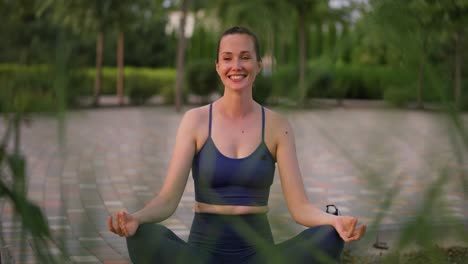 woman meditating outdoors