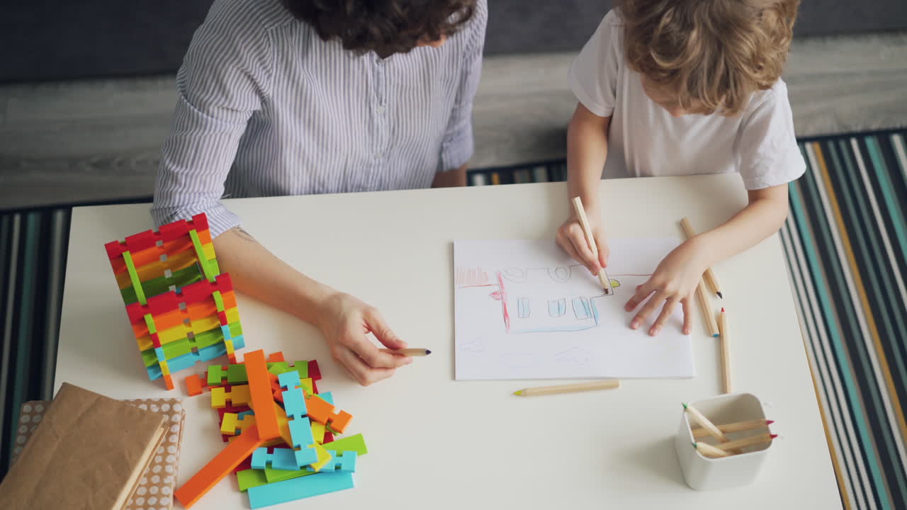 Mother and Son Drawing and Playing Together